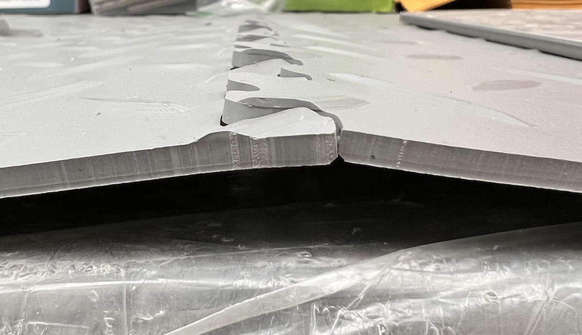 How much room to leave for SupraTile around the perimeter so the tiles can expand and contract?